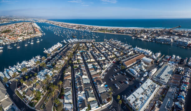 Newport / Balboa aerial view of Newport Beach / Balboa harbor in California newport beach california stock pictures, royalty-free photos & images