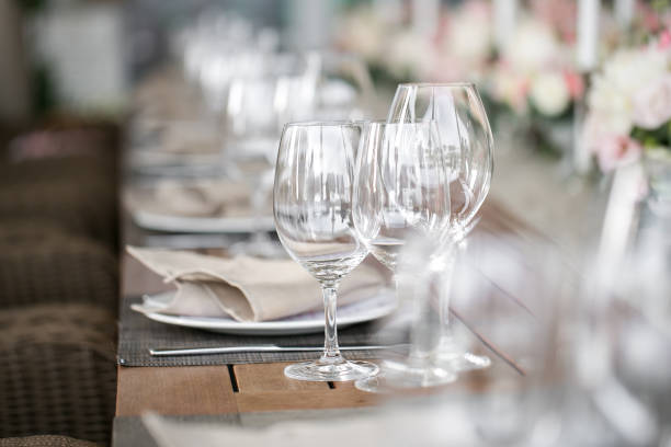 istock linen textile. Decorated table, a plate of neatly arranged napkin, fork and knife. 826047140