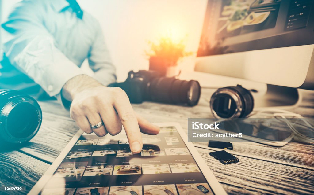 Fotografen computer mit Foto bearbeiten Programme. - Lizenzfrei Fotograf Stock-Foto