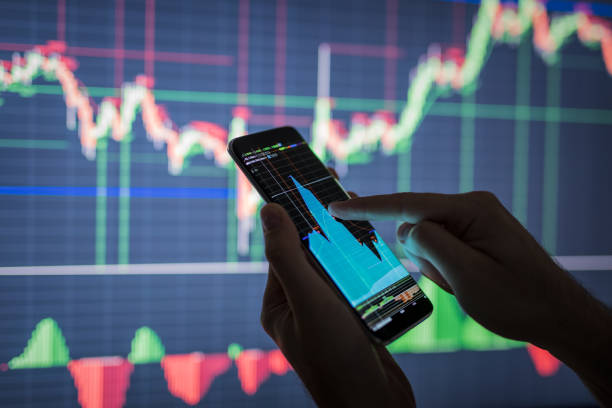 Businessman checking stock market data.