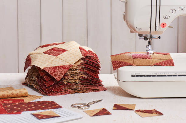 istock Quilt blocks sewing with an electric sewing machine, pile ready blocks 826058772