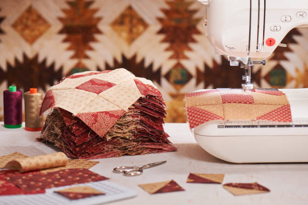 istock Quilt blocks sewing with an electric sewing machine, pile ready blocks 826058776