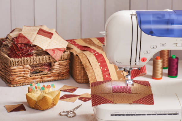 istock Quilt blocks sewing with an electric sewing machine, pile ready blocks 826058784