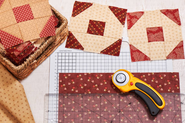 istock Cut fabric for sewing quilt blocks, pile ready blocks, equipment 826058792