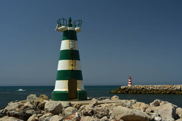 istock Two headlights, green and white and red 826070038