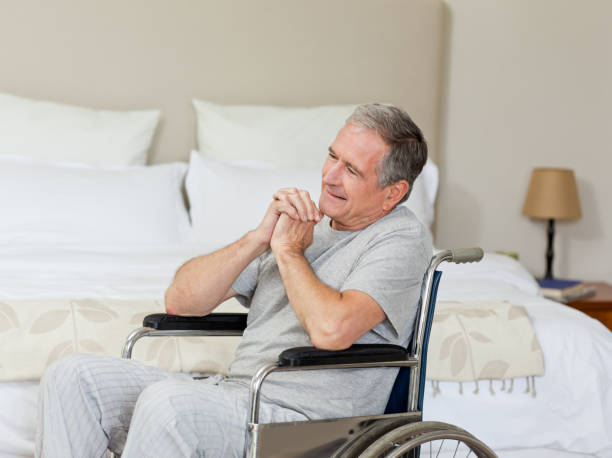 istock Smiling senior man in his wheelchair 826085096