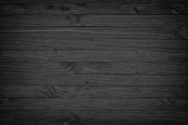 черный деревянный фон или мрачная текстура древесного зерна - construction material wood wood grain timber стоковые фото и изображения