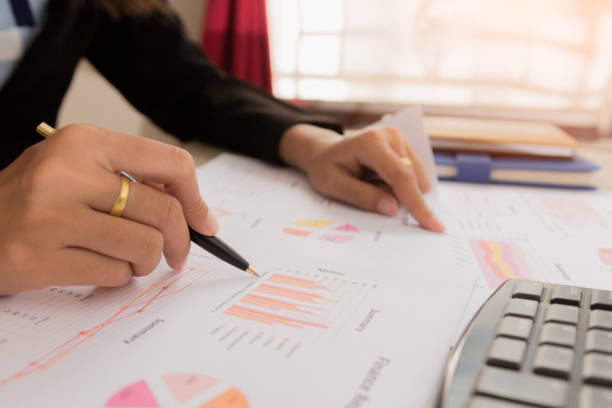 istock Businessman check profit document and calculate about and note data cost at home ,Finance managers task,Concept business and finance 826087980