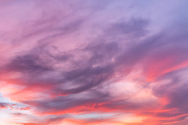 istock Purple and Pink Swirly Colorful Clouds 826123194