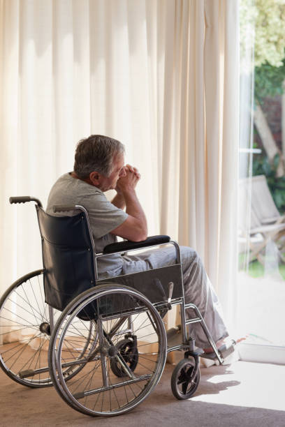 istock Senior man in his wheelchair 826130320