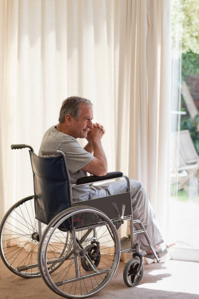 istock Senior man in his wheelchair 826130338