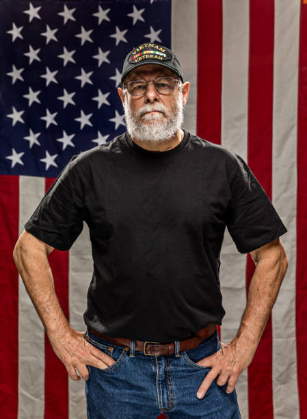 istock Authentic Vietnam Veteran with American Flag 826134848