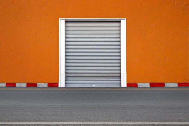 istock Roller shutters the factory buildings for warehouse 826143974