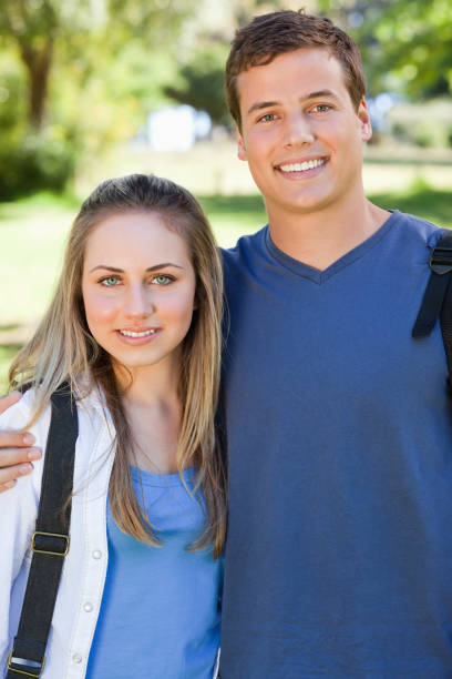 istock Portrait of a young couple smiling 826155238