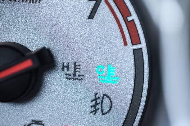istock car engine cool light on car dash board meter gauge driver warning to wait warm heating engine 826155714