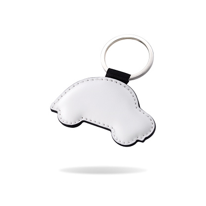 Leather key ring in car shape on isolated white background. Blank key chain for your design. ( Clipping path or cut out object for montage )