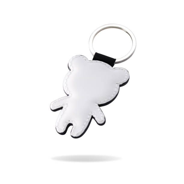 istock Leather key ring in bear shape on isolated white background. Blank key chain for your design. ( Clipping path or cut out object for montage ) 826157958