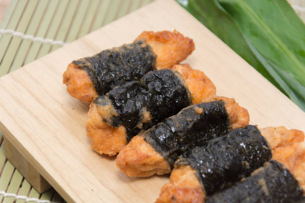 istock seaweed chicken roll on wood board 826158108