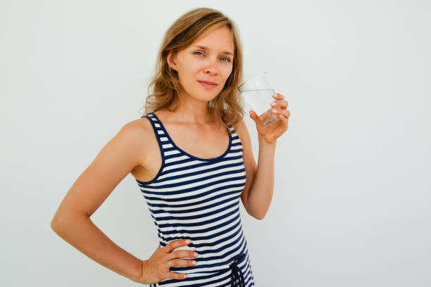 istock Content Nice Woman Drinking Water From Glass 826163892