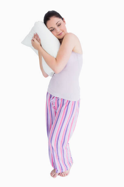 istock Standing woman sleeping on a pillow 826166598