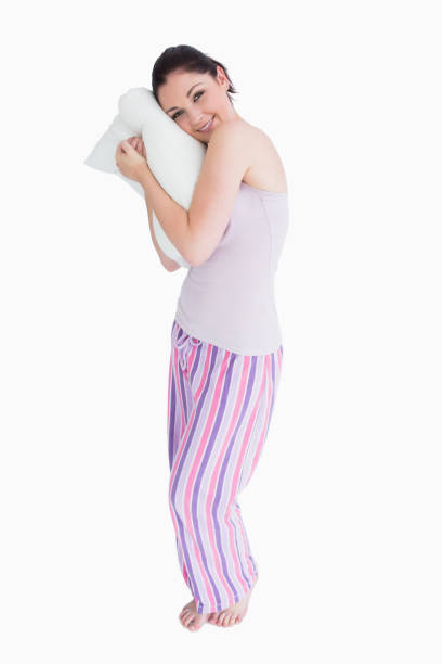 istock Standing woman relaxing on her comfortable pillow 826166604