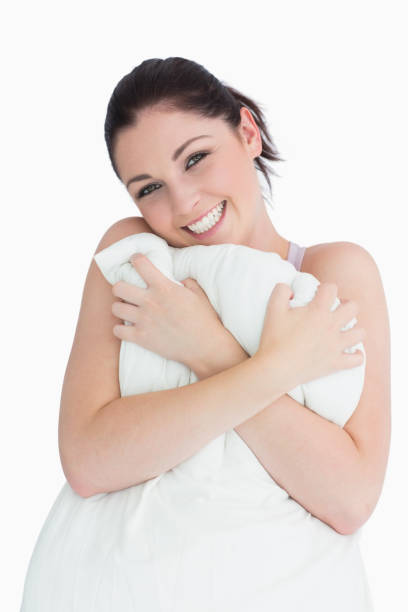 istock Woman holding a pillow 826166718