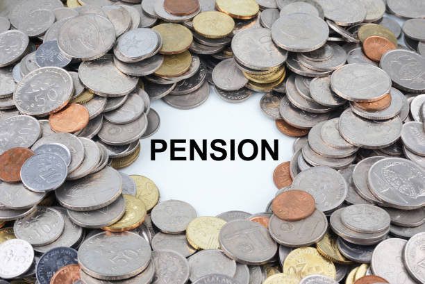 istock PENSION text centre of coins on saving concept 826167040