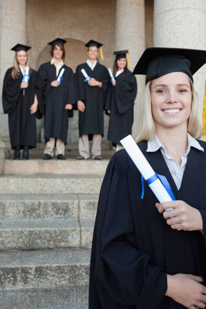 istock Close up of a blonde graduate smiling 826170852