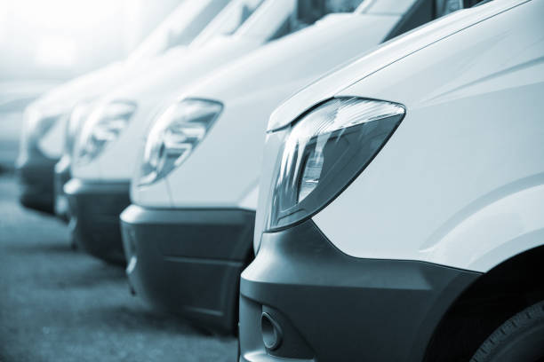 istock A row of white delivery vans 826171208
