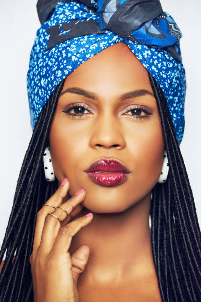 istock Sensual black woman in ethnic clothes touching face 826171492