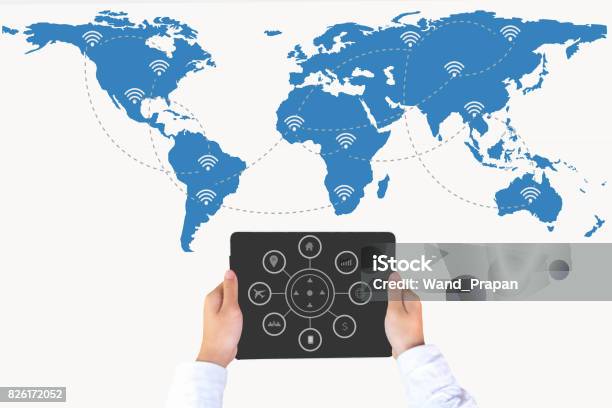 Hand Holding Smart Phone On World Map Network And Wireless Communication Network Abstract Image Visual Stock Photo - Download Image Now