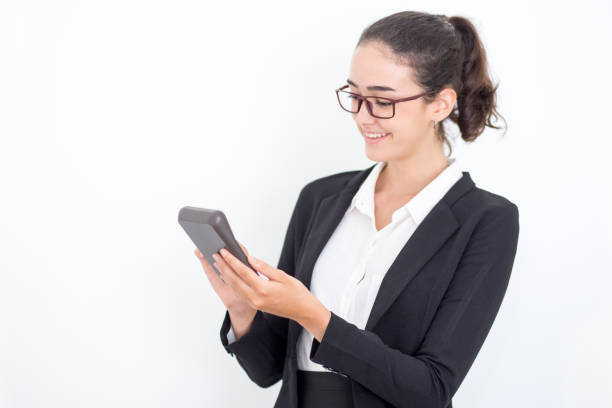 istock Cheerful businesswoman counting on calculator 826172170