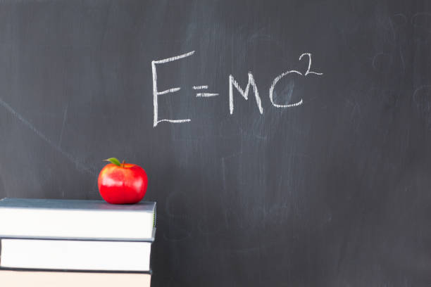 istock Books with an apple and a blackboard 826176314
