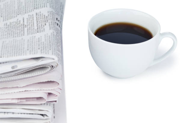 istock Stack of newspapers and cup of coffee 826178850