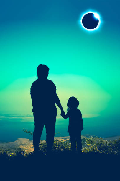 istock Amazing scientific natural phenomenon. Total solar eclipse glowing on sky. 826182398