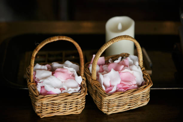 Basket of rose petals Basket of rose petals for flower girls flower girl stock pictures, royalty-free photos & images