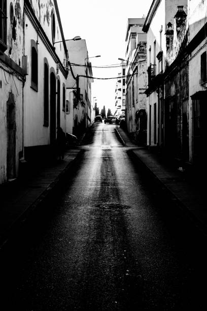 istock Small street in Spain lit up by sunset 826191400