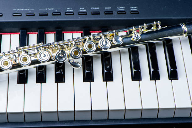 istock flute instrument on the piano keyboard 826196948
