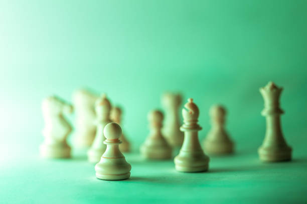 chess pieces with white background illuminated with low light - board game piece leisure games blue isolated imagens e fotografias de stock