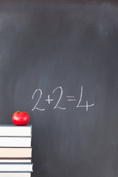 istock Books with an apple and a blackboard 826207784