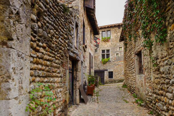 istock Narrow street in  Perouges, France, a medieval walled town, a popular touristic attraction. 826220226