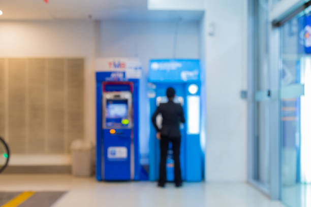 istock Blurly abstract Female employees are transacting at ATMs. 826228772