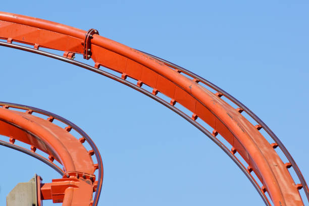 istock Rollercoaster against blue sky in the evening 826235724
