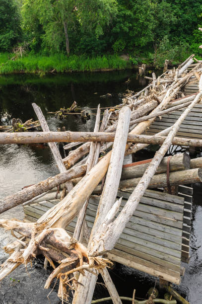 istock Part of a broken bridge over the river 826236516