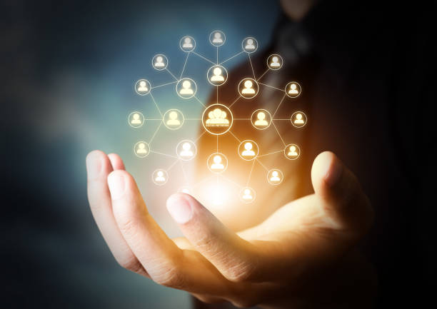 istock man hand holding social network icon, networking concept 826239816