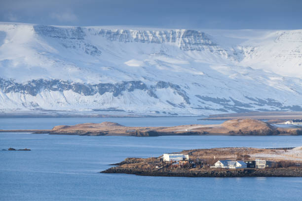 istock Icelandic coastal landscape. Snowy mountains 826239844