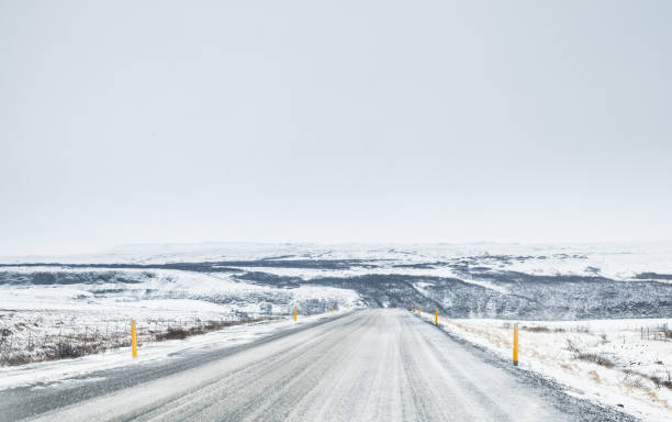 istock Icelandic road covered with ice and snow 826239866