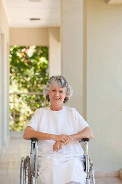 istock Woman in her wheelchair 826241398
