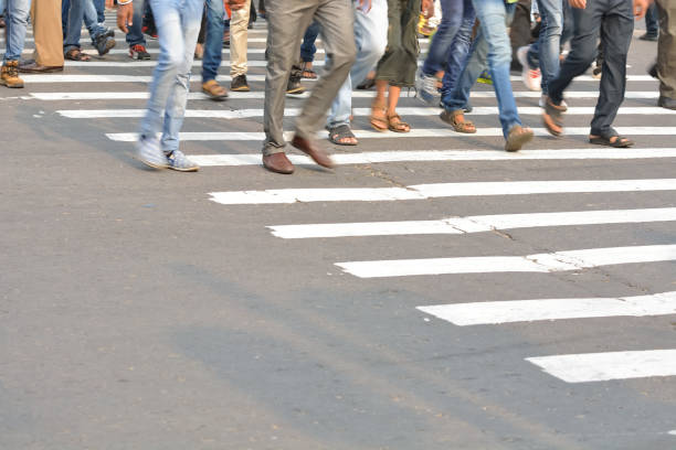 istock Pedestrians crossing road 826241810