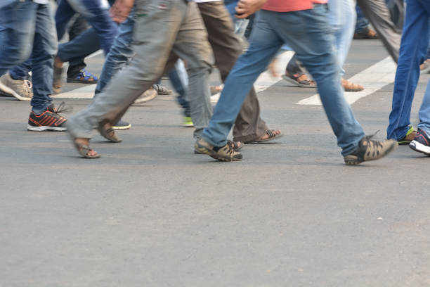 istock Pedestrians crossing road 826251702
